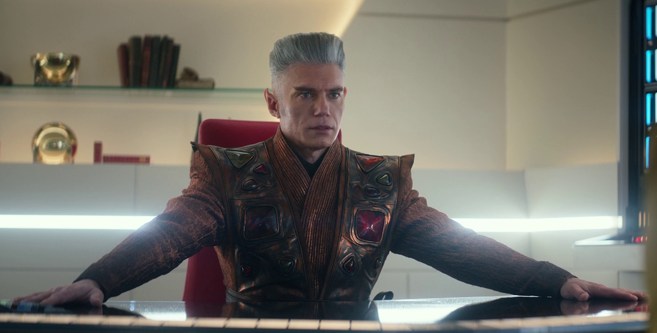 Still frame from Star Trek: Strange New Worlds, 3x08, Four-and-a-Half Vulcans showing Pike at his desk.