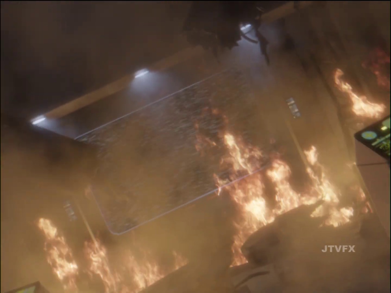 Still frame from JTVFX's Wolf 359 fan film showing a starship bridge on fire.