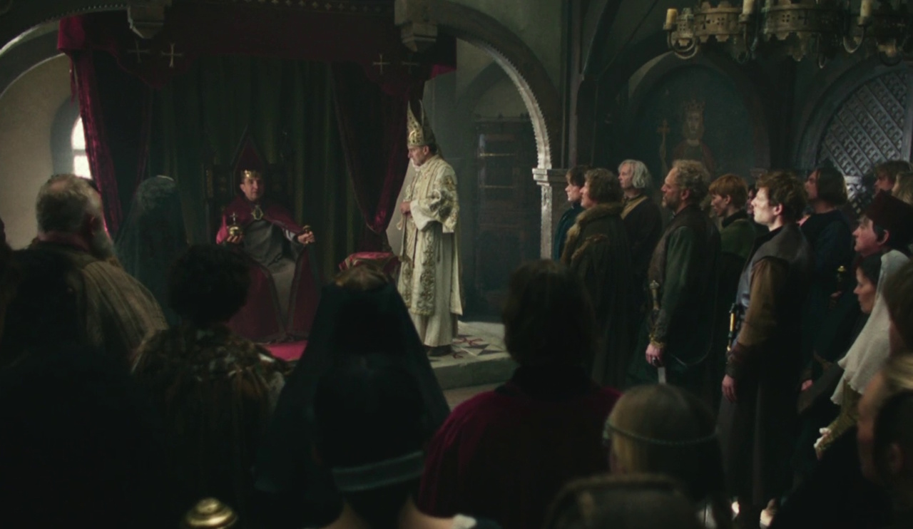 Still frame from King & Conqueror (2025) showing Edward's coronation.