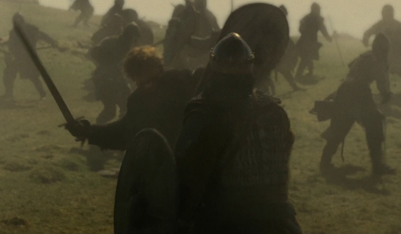 Still frame from King & Conqueror (2025) showing William and Harold in combat.