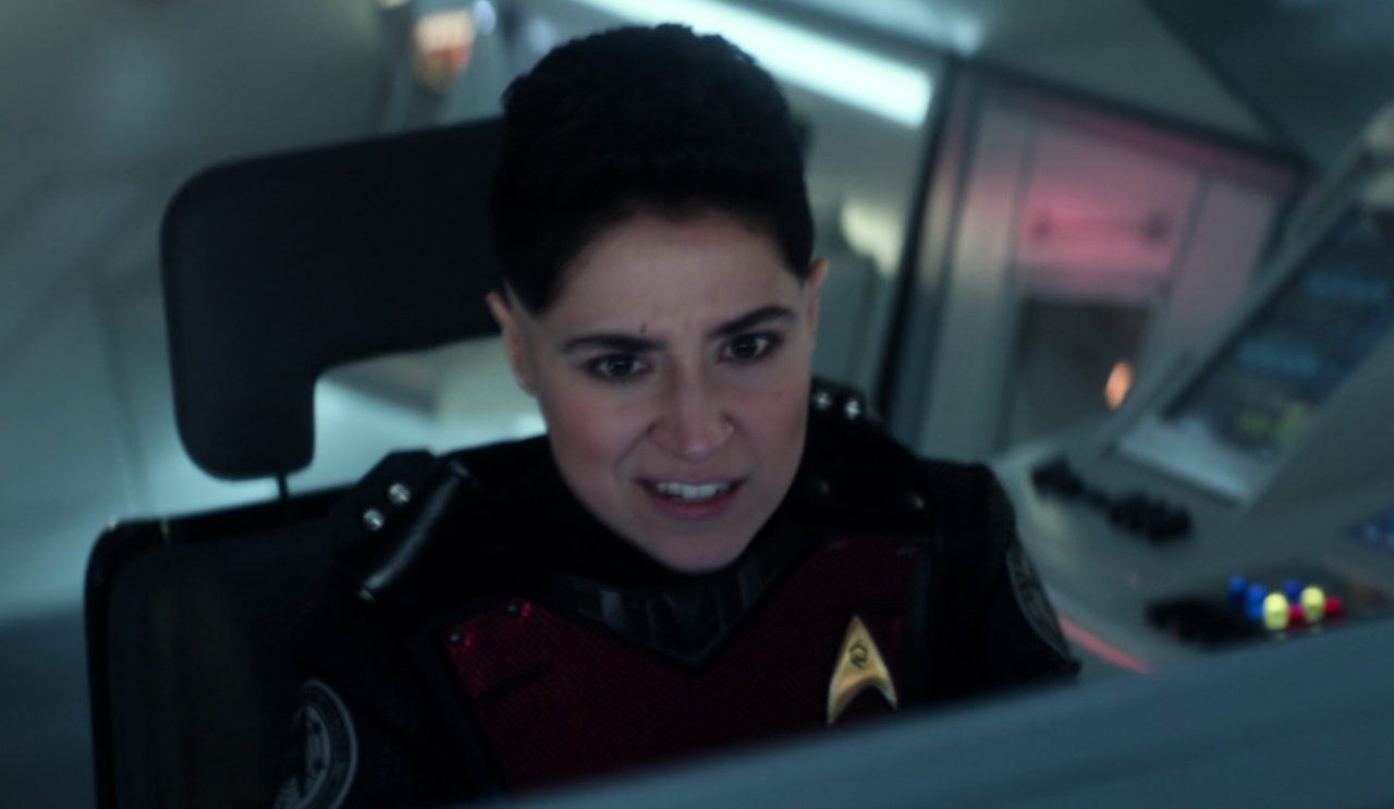 Still frame from Star Trek: Strange New Worlds 3x09: Terrarium, showing Ortegas piloting her shuttle.