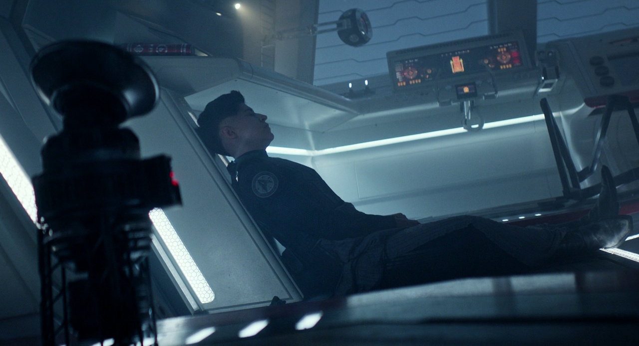 Still frame from Star Trek: Strange New Worlds 3x09: Terrarium, showing Ortegas on the shuttle, resting.