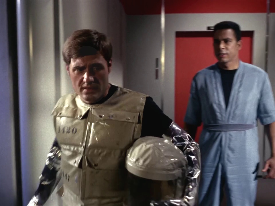 Still frame from Star Trek: The Original Series S01, E01, "The Man Trap," showing Barnhart and the M-113 Creature.