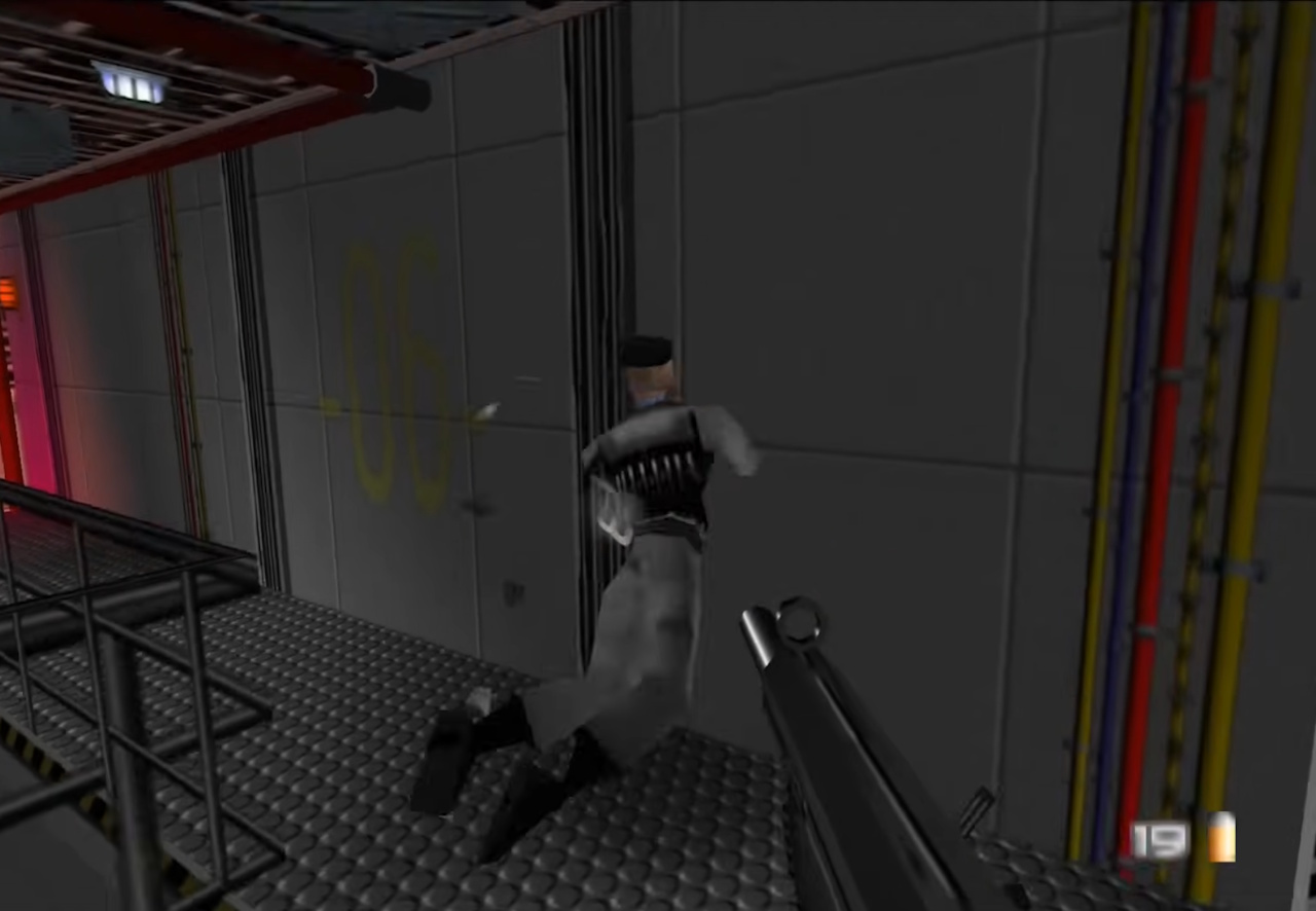 Screenshot of GoldenEye showing the player character shooting an enemy.