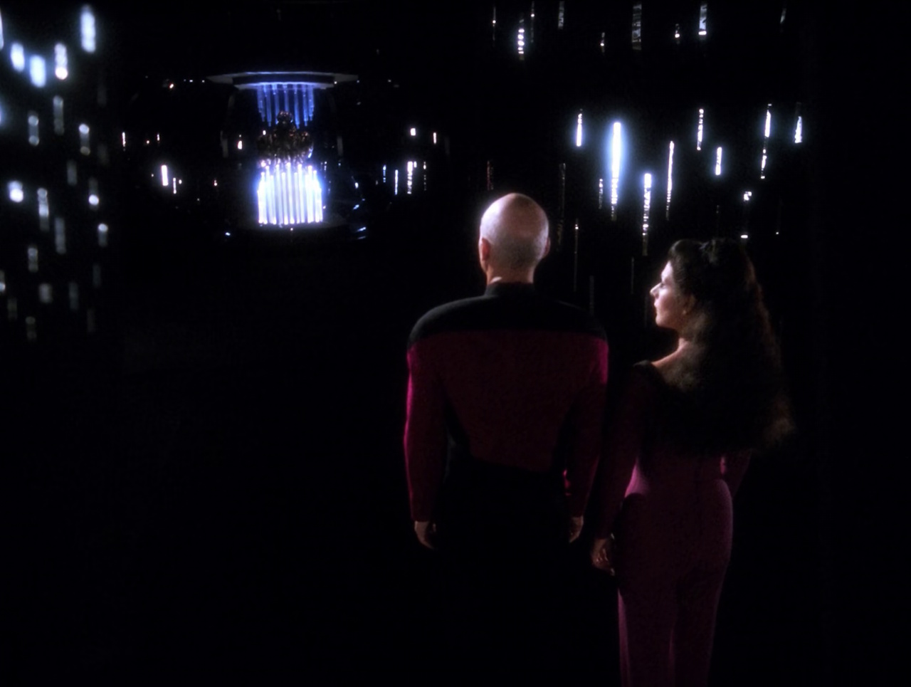 Still frame from Star Trek: The Next Generation showing Picard, Troi, and a Sheliak.