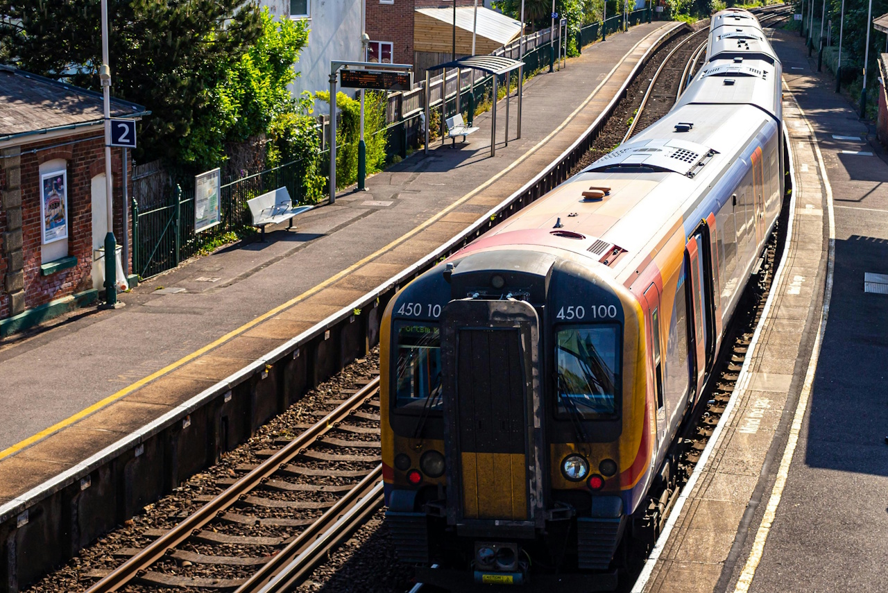 Stock photo of a train at a railway station.