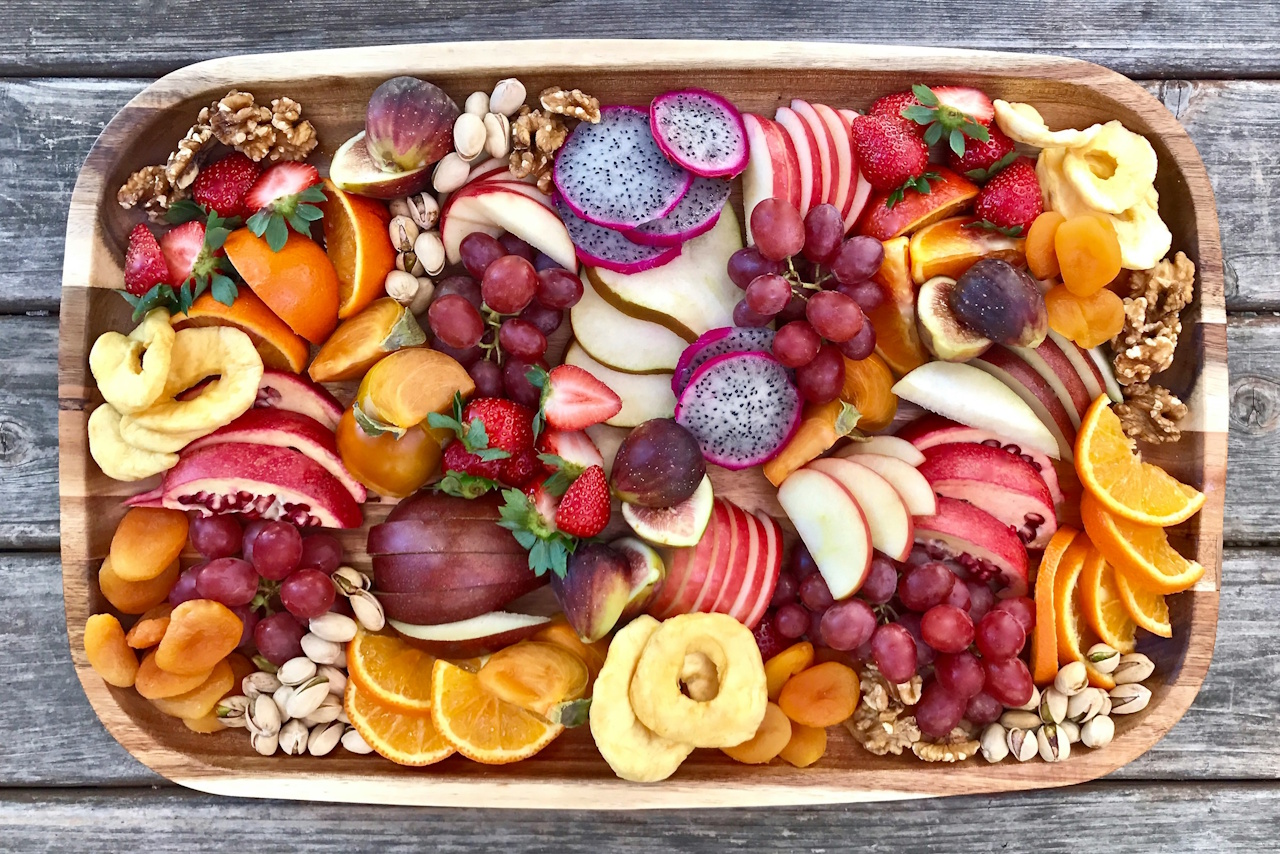 Stock photo of fruit on a wooden platter.
