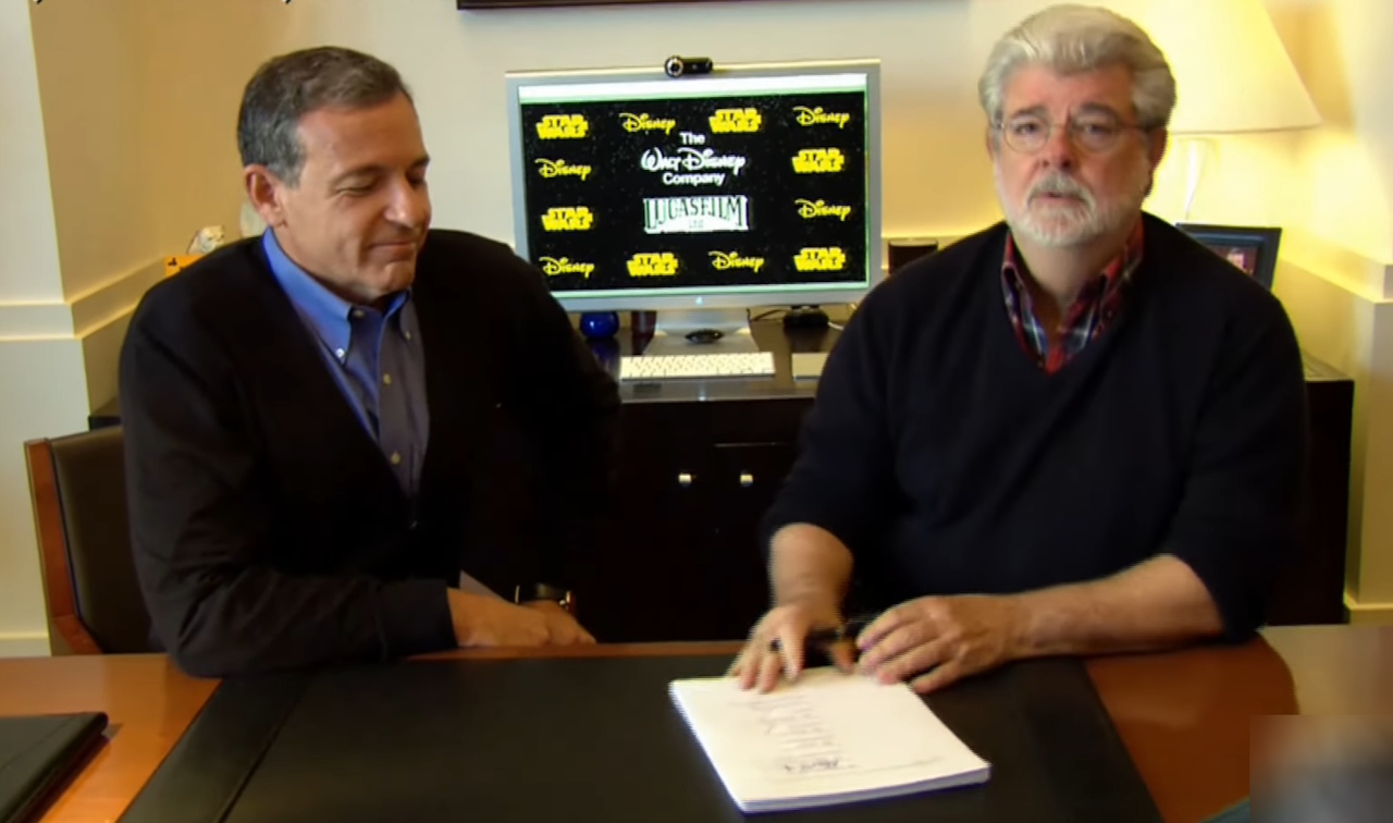 Still frame of Disney's Bob Iger and Lucasfilm's George Lucas at the offical sale of Lucasfilm in 2012.
