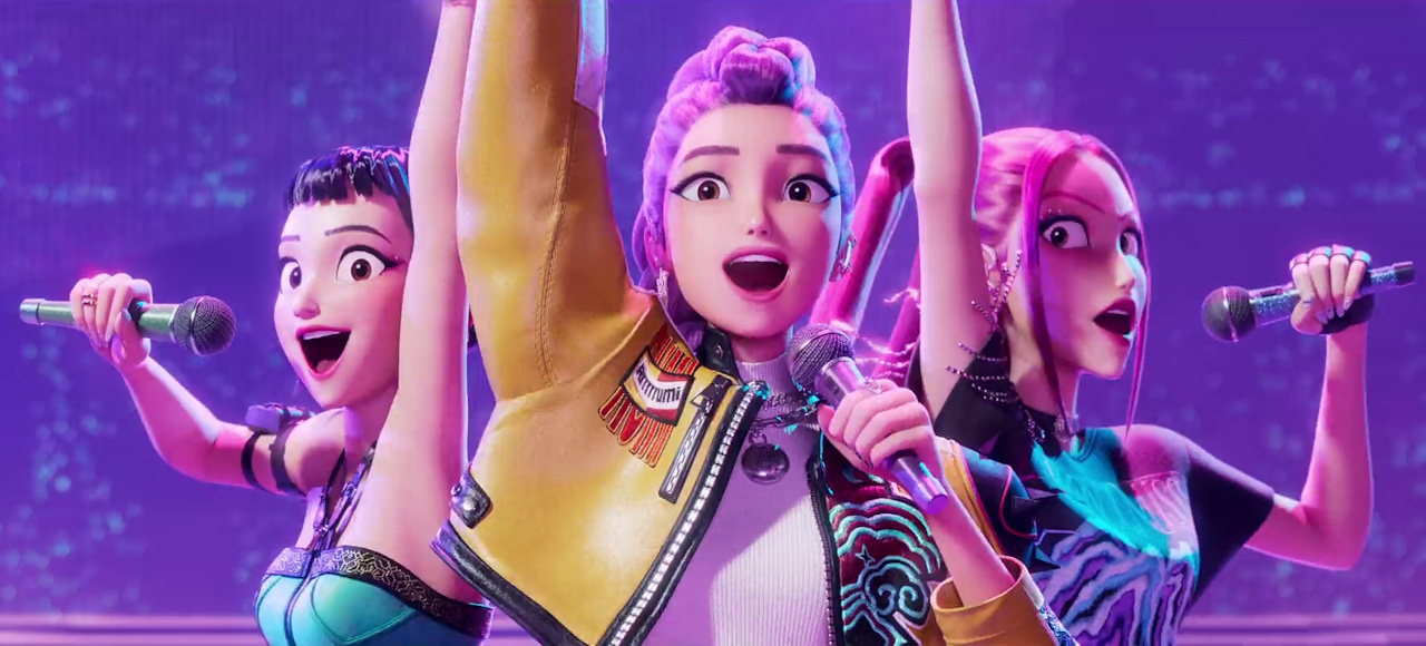 Still frame from KPop Demon Hunters (2025) showing Huntr/x (Zoey, Rumi, and Mira) singing.