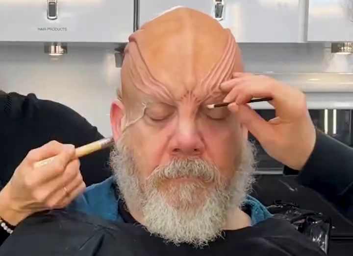 Still frame from a Star Trek: Starfleet Academy promo video showing Paul Giamatti in the makeup chair.