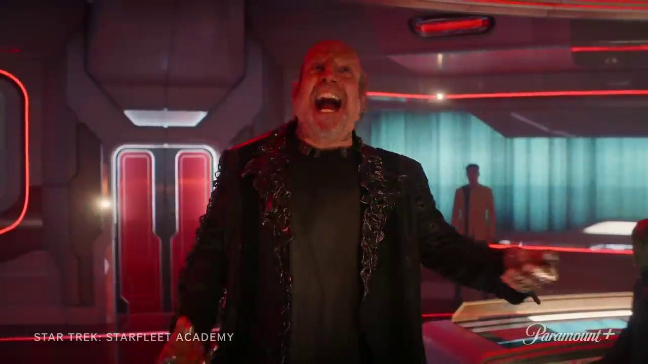 Still frame from the Star Trek: Starfleet Academy promotional clip showing Nus Braka laughing.