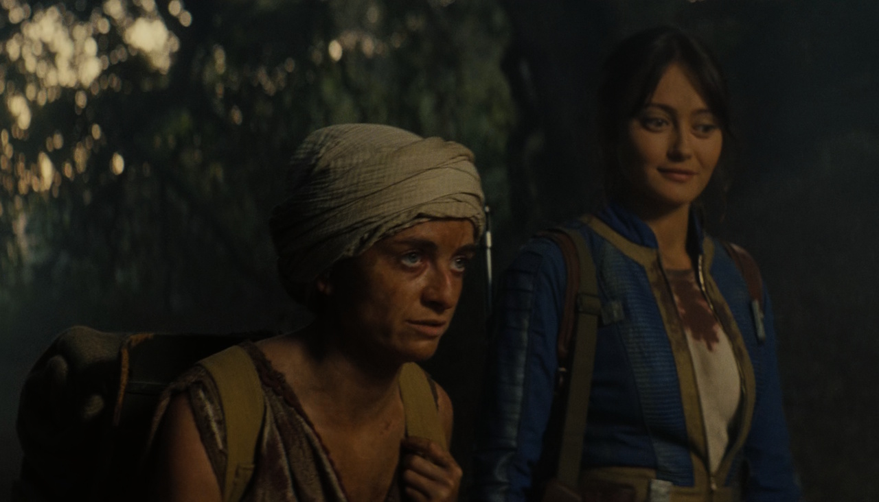 Still frame from Fallout S2 showing Lucy and a girl.