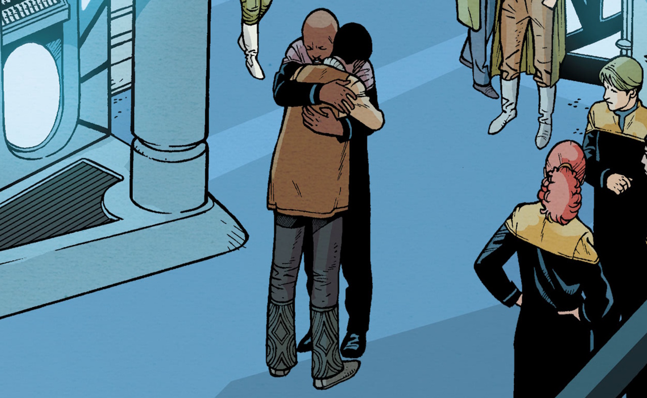 Crop from the comic Star Trek: Godshock showing Jake and Ben Sisko embracing.