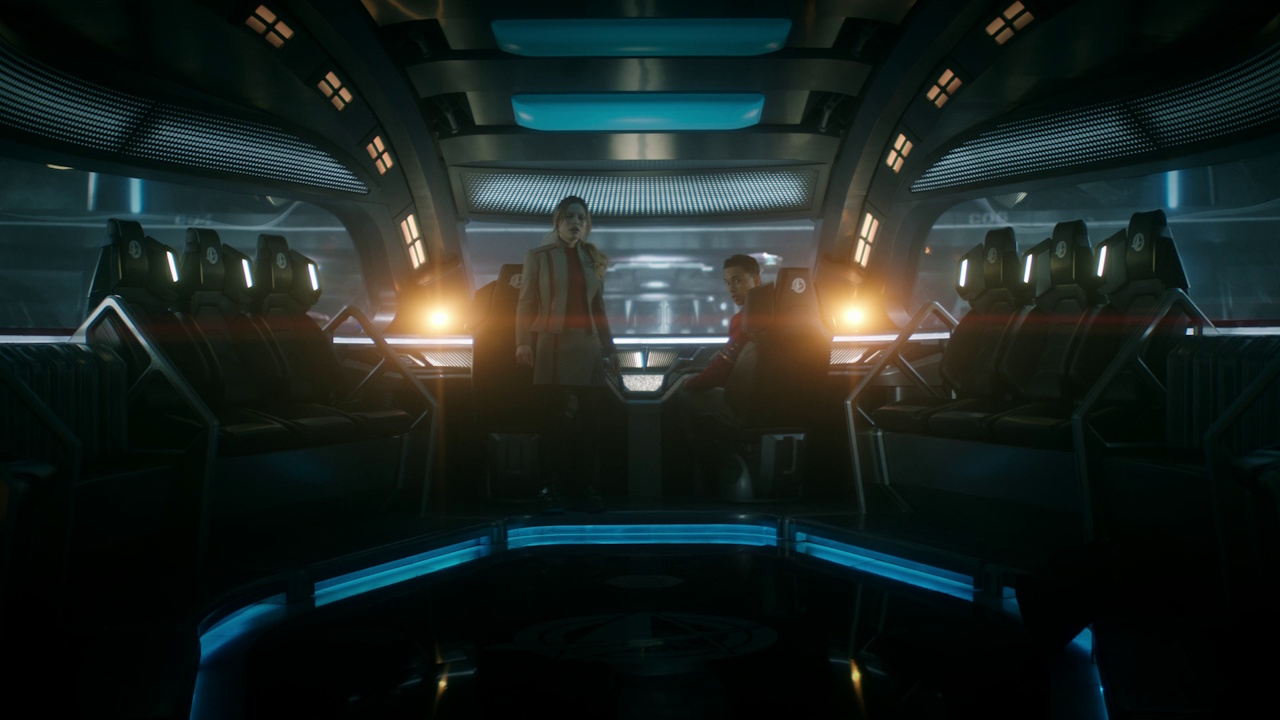 Still frame from 300th Night showing Genesis and Caleb in a shuttle