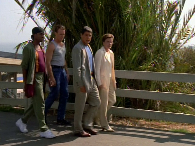 Still frame from Future's End showing the away team in the 90s