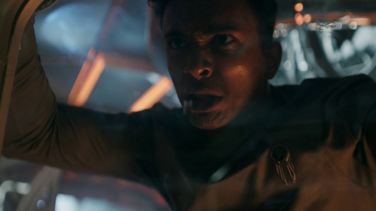 Still frame from Kids These Days showing Caleb at the airlock