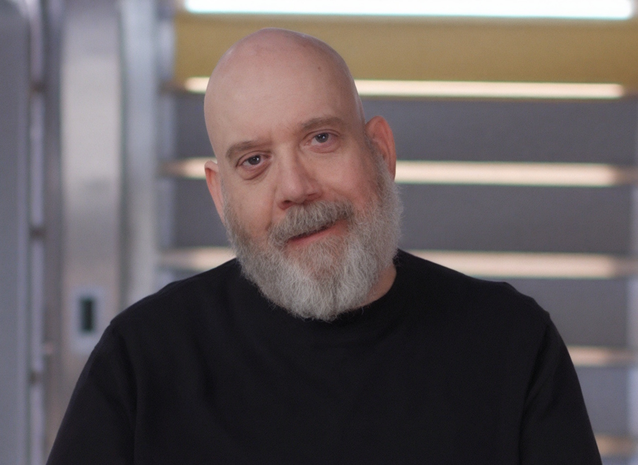 Still frame from a Star Trek SFA event showing Paul Giamatti (Braka)