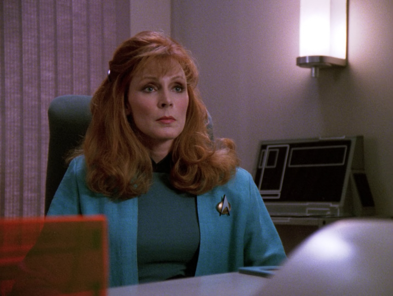 Still frame from Star Trek TNG S5 showing Dr Crusher