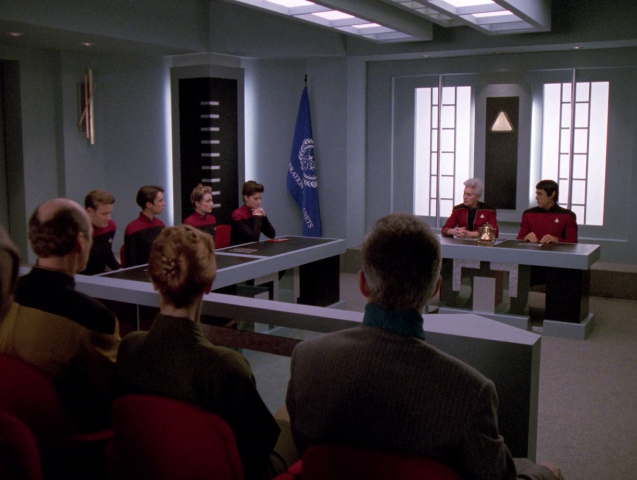 Still frame from Star Trek TNG S5 showing a courtroom