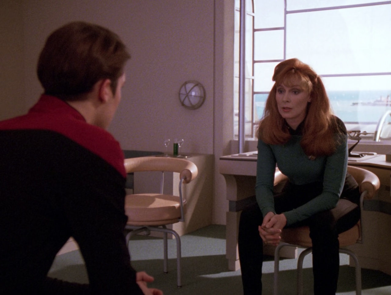 Still frame from Star Trek TNG S5 showing Wesley and Beverly Crusher
