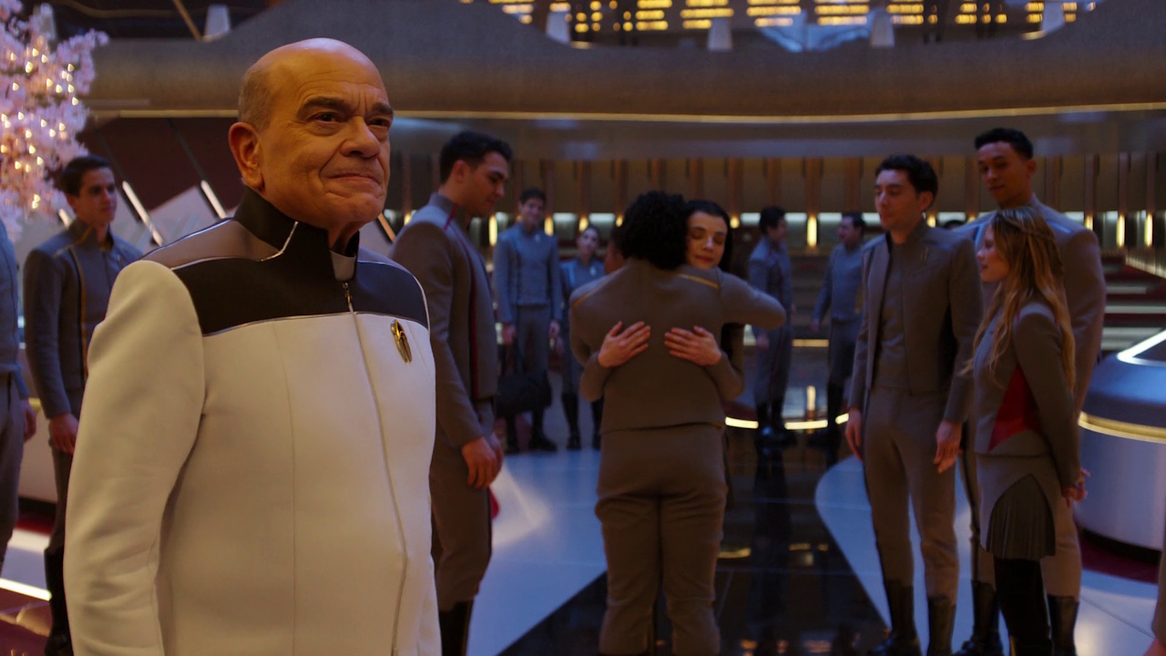 Still frame from Star Trek SFA 1x08 showing the Doctor and the cadets