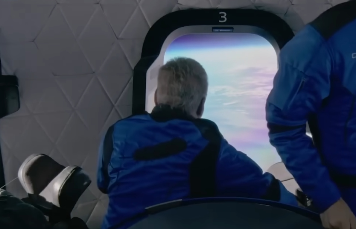 Still frame from the Blue Origin mission showing William Shatner in space