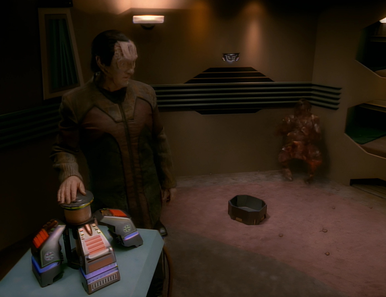 Still frame from Star Trek DS9 showing Garak and Odo
