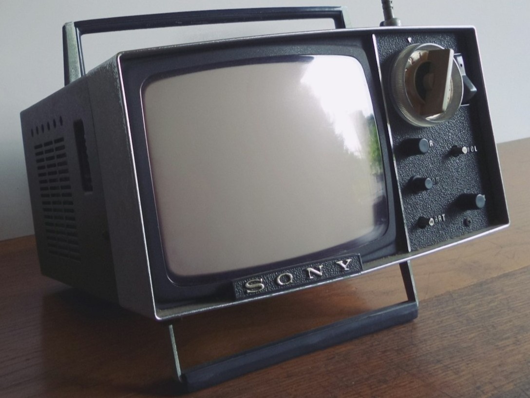 A stock photo of a small portable CRT TV set