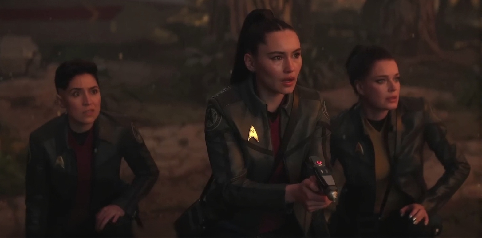 Still frame from the Star Trek SNW S4 trailer showing Ortegas, La'an, and Una mirrored