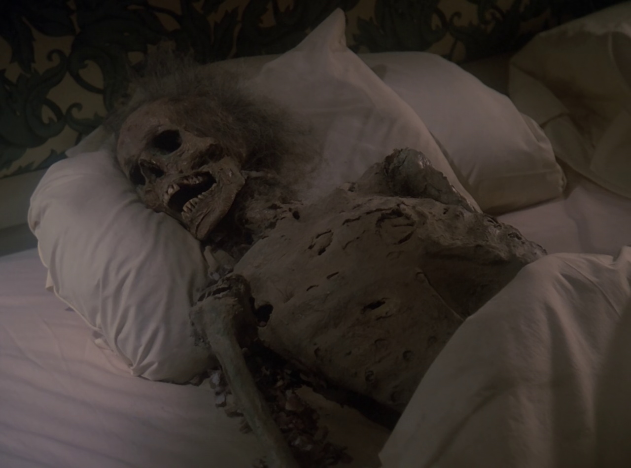 Still frame from Star Trek TNG The Royale showing a skeleton