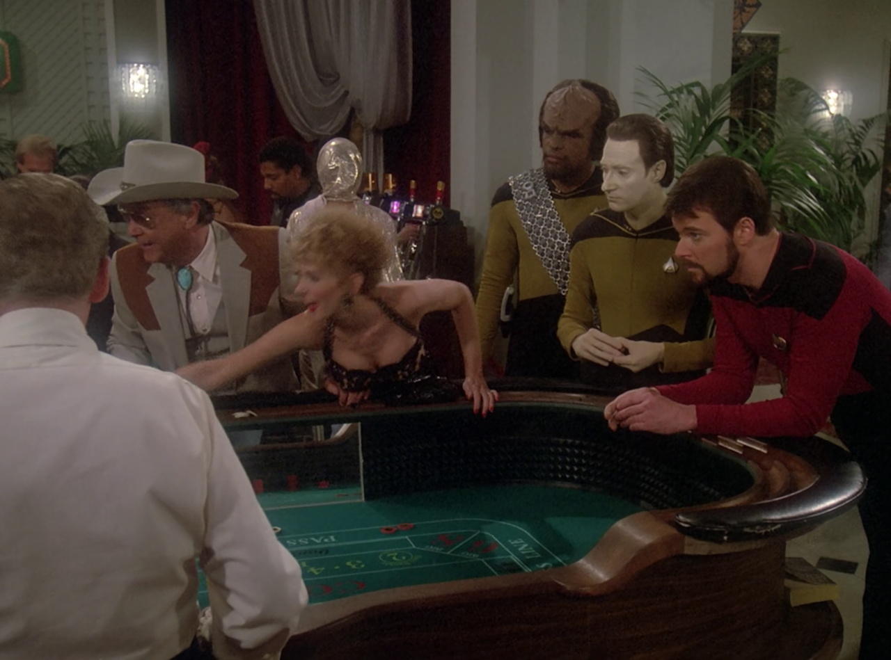 Still frame from Star Trek TNG The Royale showing a craps game