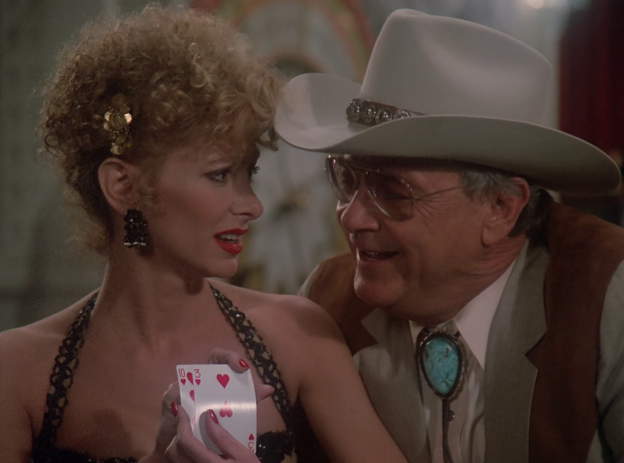 Still frame from Star Trek TNG The Royale showing Vanessa and "Texas"