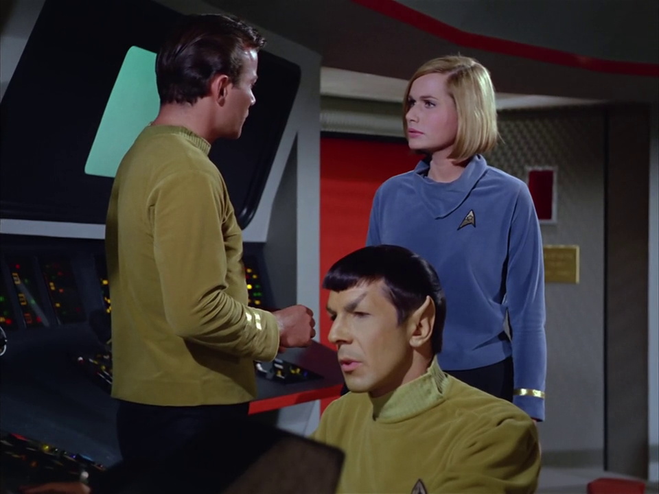 Still frame from Star Trek TOS showing Kirk, Spock, and Dehner
