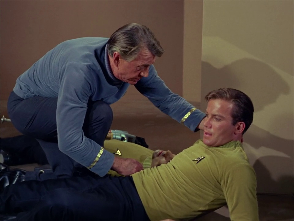 Still frame from Star Trek TOS showing Kirk and Dr Piper