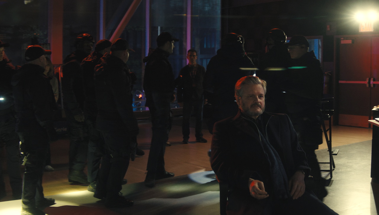 Still frame from Disclosure Day (2026) showing the Wardex agents leaving