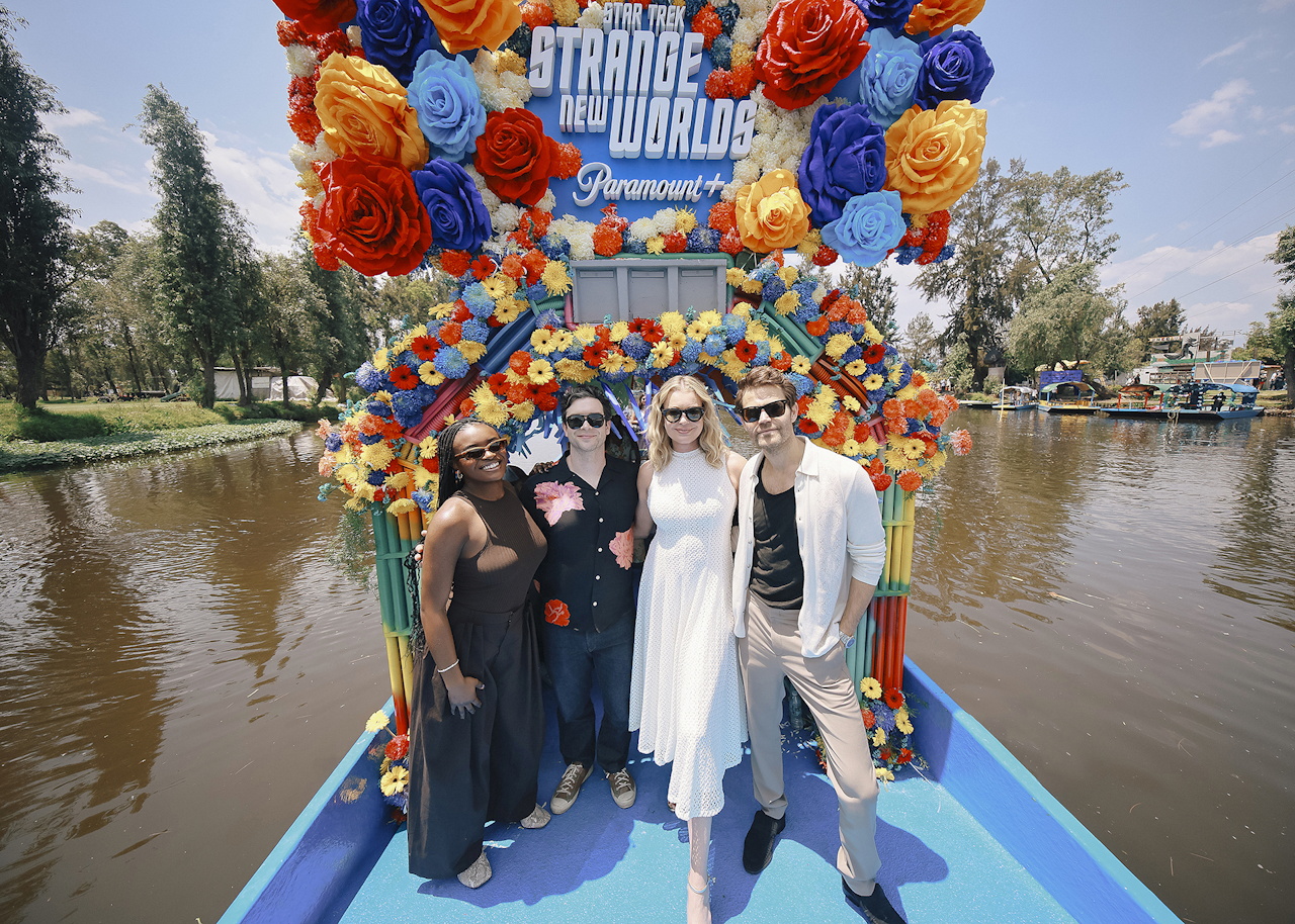Photo of some of the Strange New Worlds cast on a barge at a Star Trek promo event