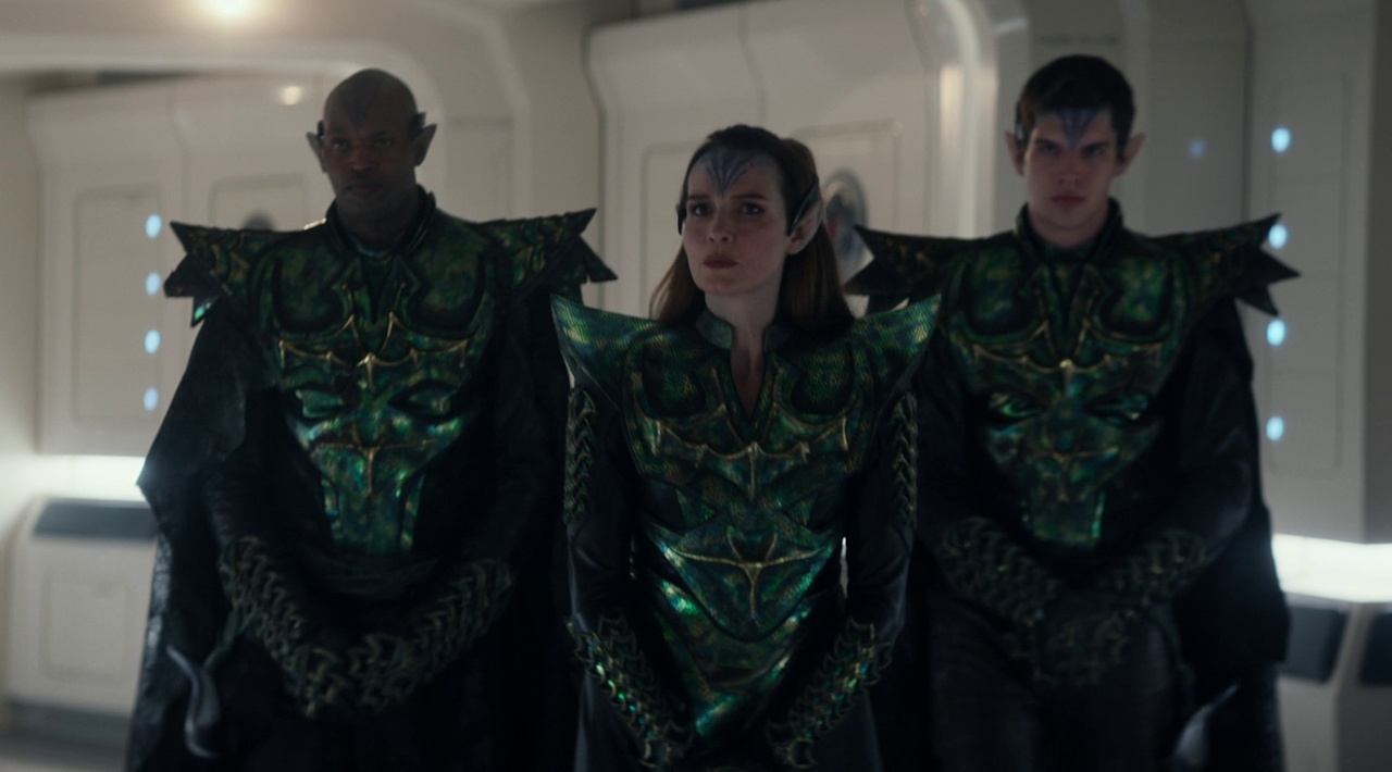 Still frame from Strange New Worlds 4x01 showing Cassell and two guards