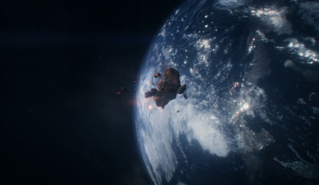 Still frame from Strange New Worlds 4x01 showing an asteroid approaching a planet