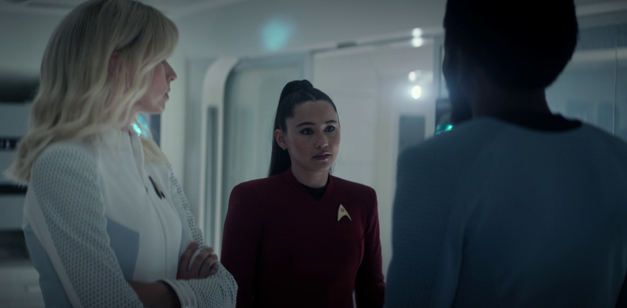 Still frame from Strange New Worlds 4x01 showing La'an with Chapel and M'Benga