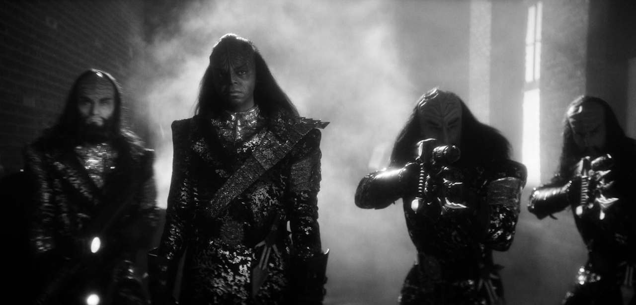Still frame from Star Trek SNW 4x04 showing Kor and three Klingons