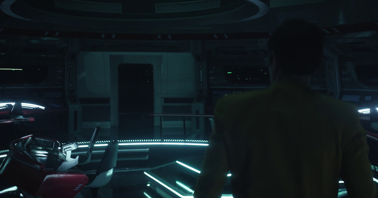 Still frame from Star Trek SNW 4x02 showing Kirk on the dark bridge