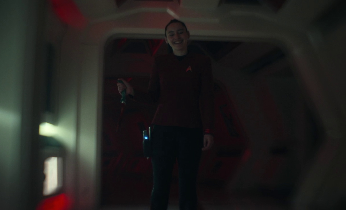 Still frame from Star Trek SNW 4x02 showing La'an wielding a knife