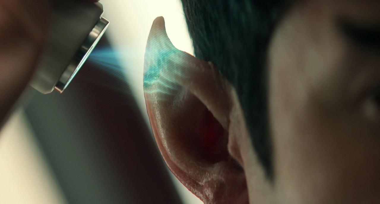 Still frame from Star Trek SNW 4x02 showing Spock's ear being repaired