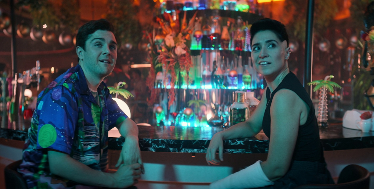Still frame from Star Trek SNW 4x03 showing Scotty and Ortegas at the bar