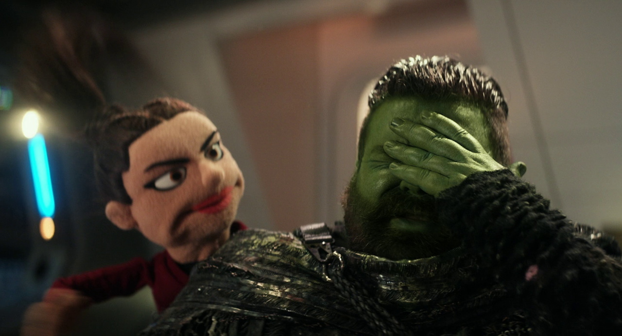Still frame from Star Trek SNW 4x05 showing puppet La'an and an Orion