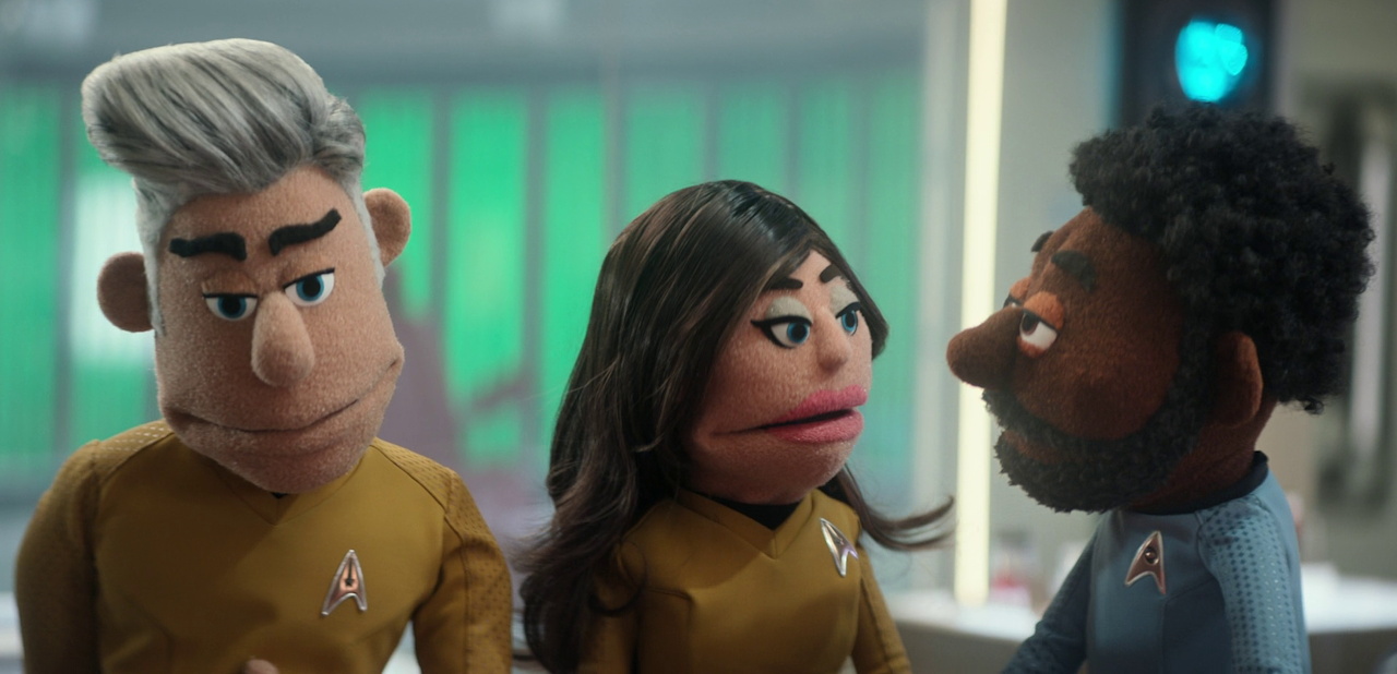 Still frame from Star Trek SNW 4x05 showing puppets of Pike, Una, and M'Benga