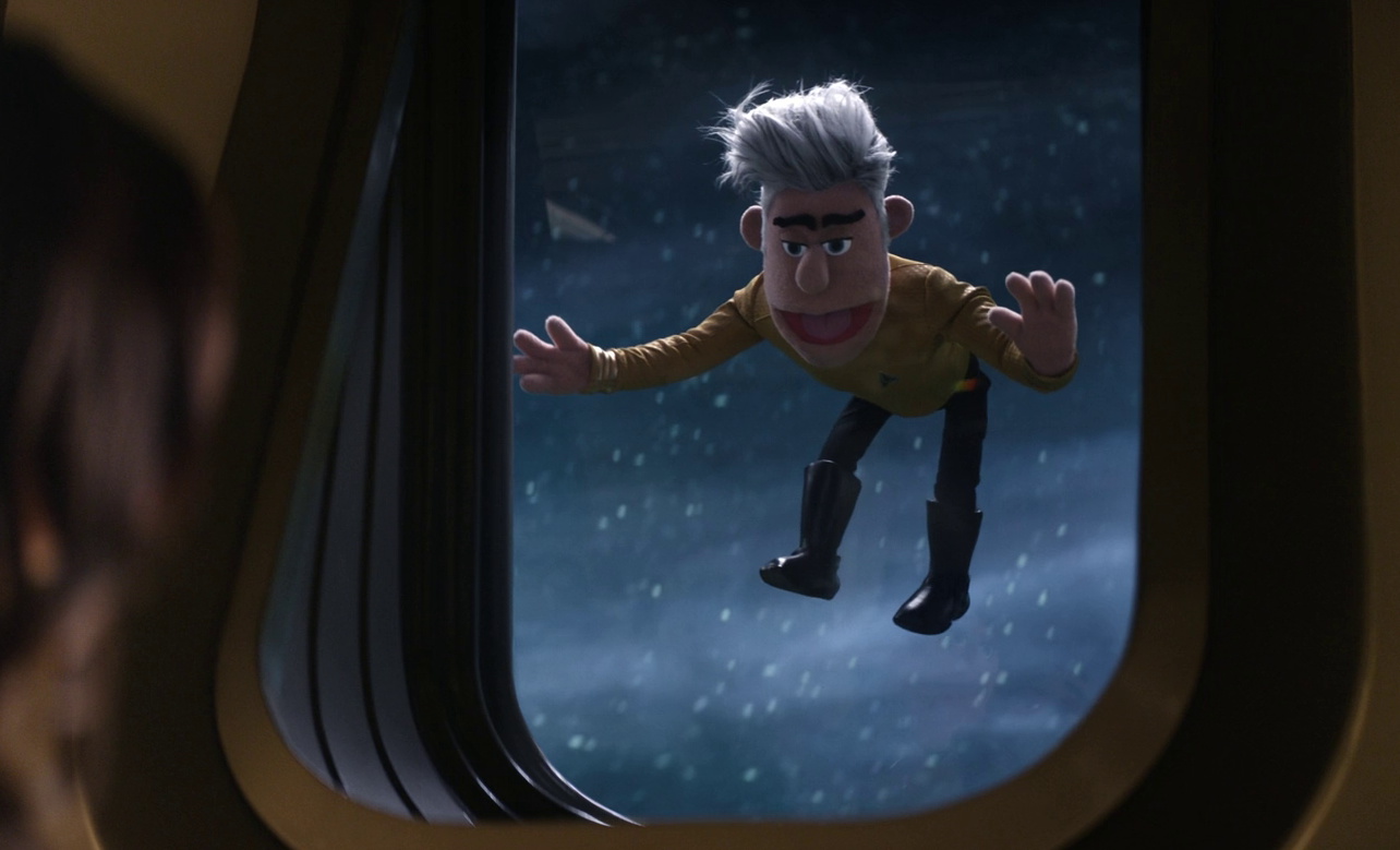 Still frame from Star Trek SNW 4x05 showing Pike floating at the window