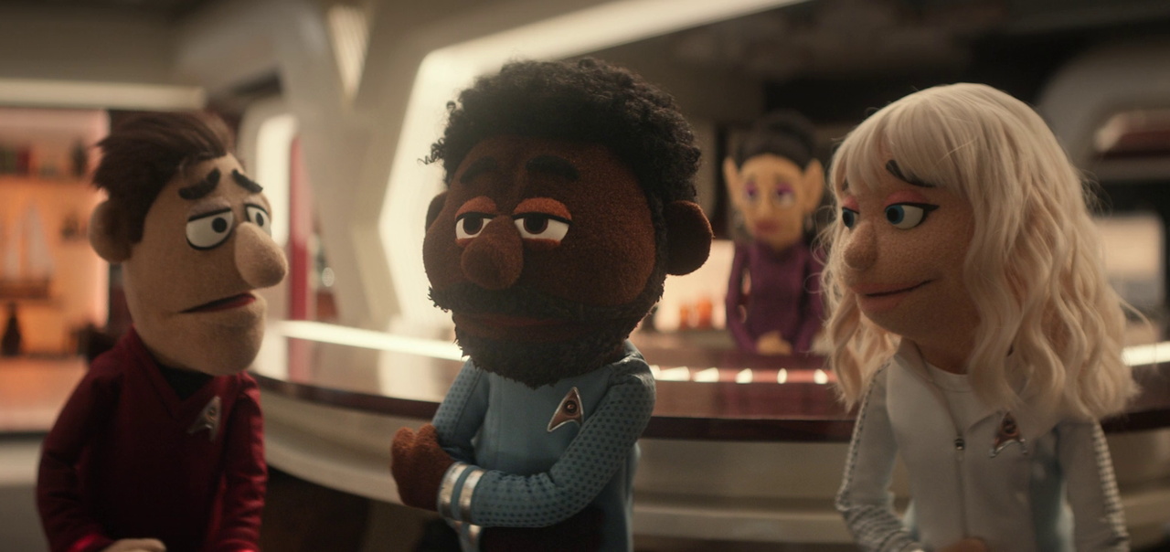 Still frame from Star Trek SNW 4x05 showing Scotty, M'Benga, T'Pring, and Chapel as puppets