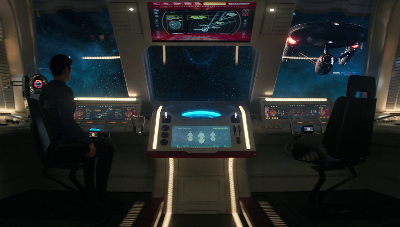 Still frame from Star Trek SNW 4x05 showing Spock, the Enterprise, and a shuttle cockpit