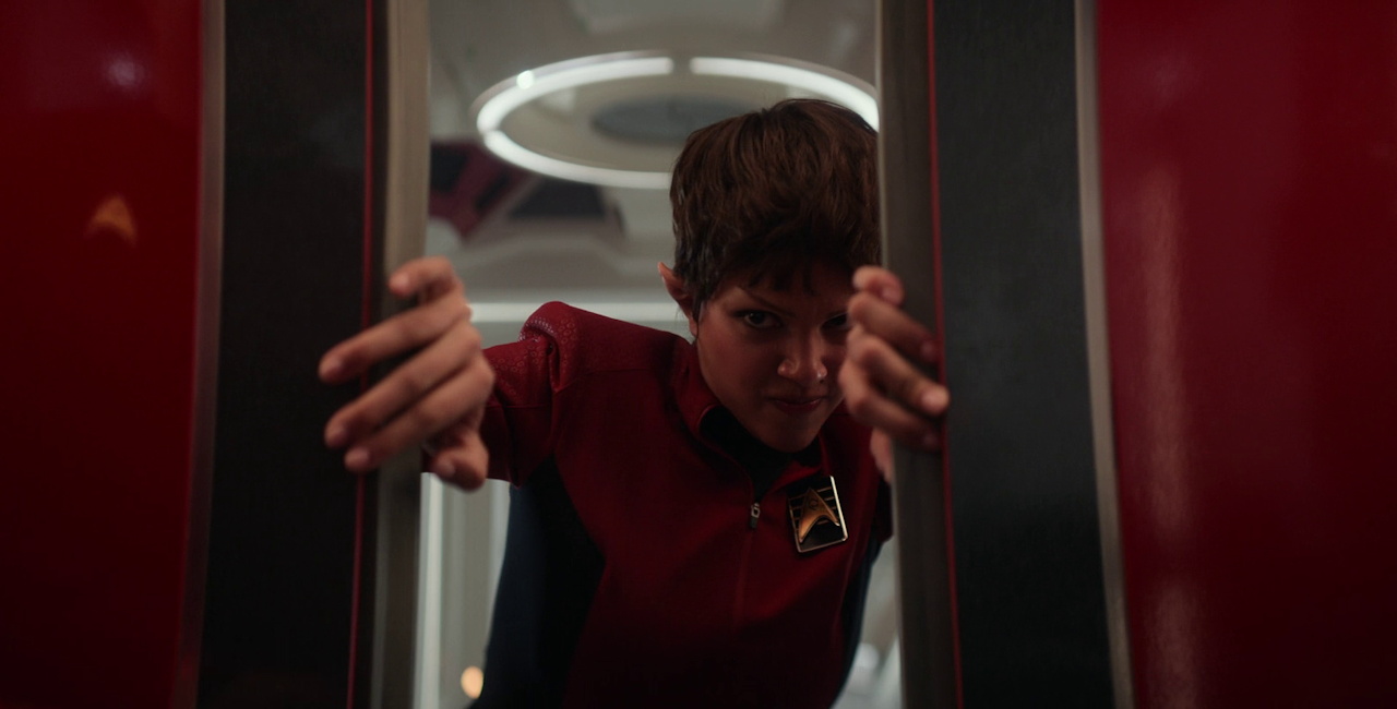 Still frame from Star Trek SNW 4x06 showing A'Sha opening the turbolift doors
